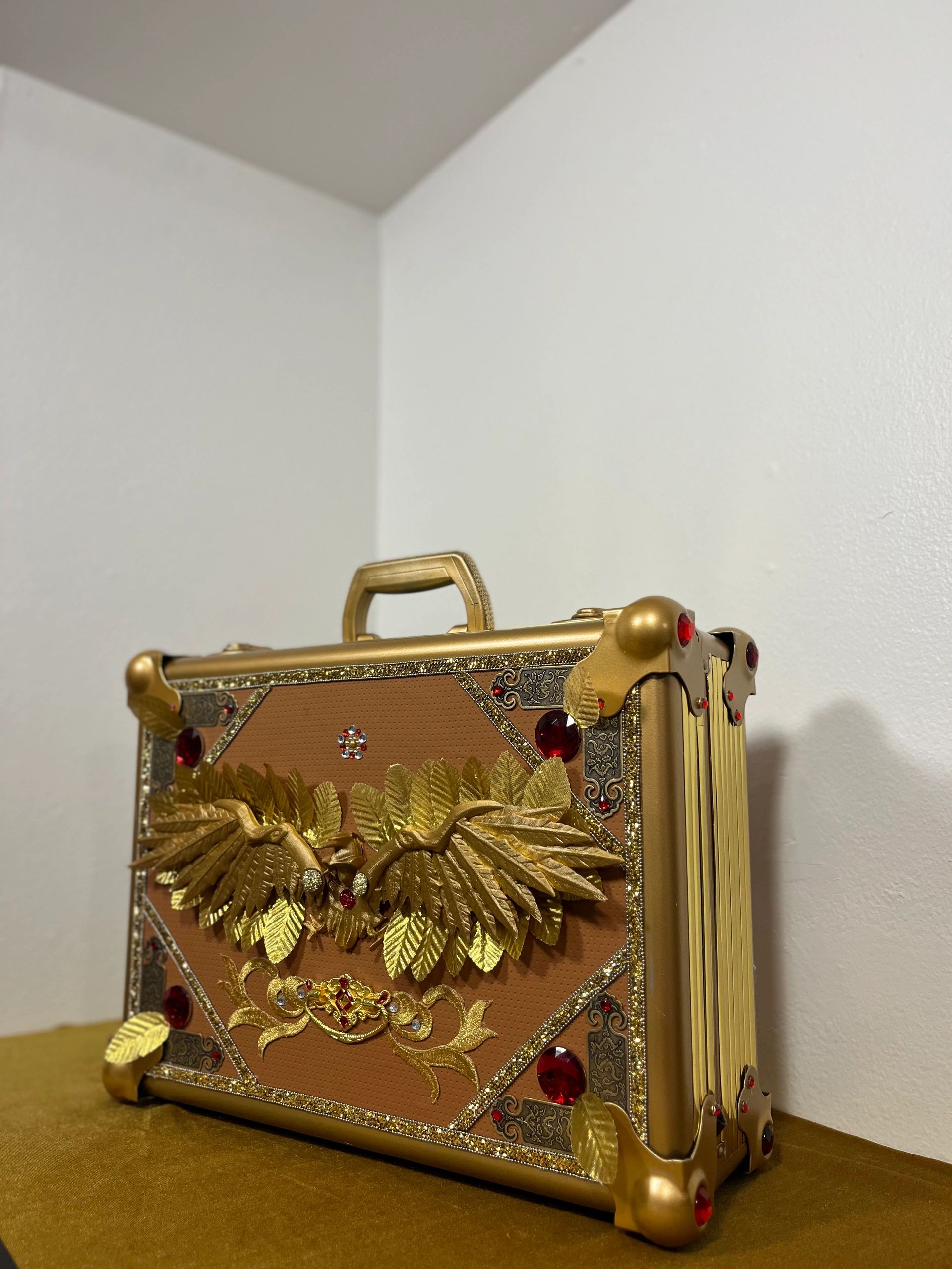 Ornate gold suitcase prop